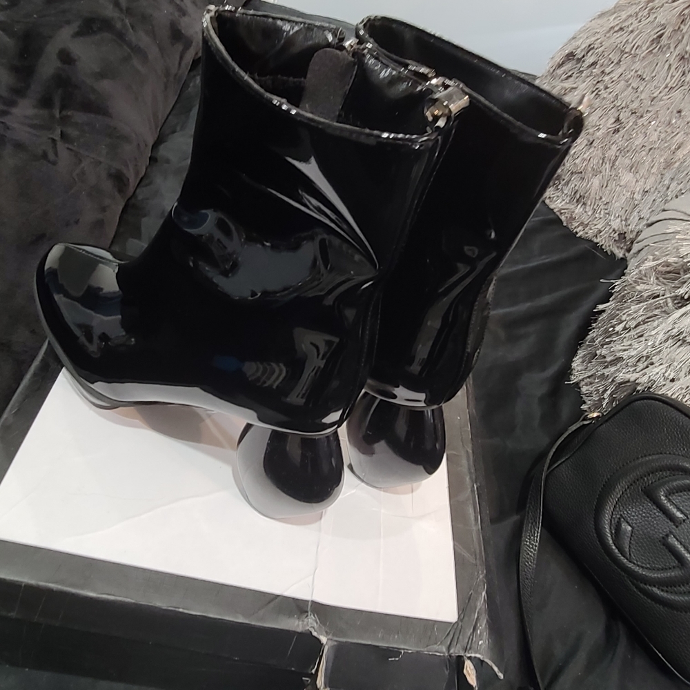 Black patient leather boots